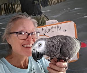 Image of Kathy LaFollett with a parrot